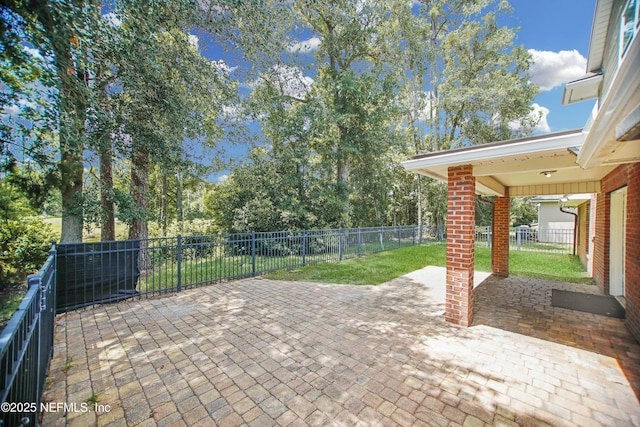 2534 Willow Creek Dr, Fleming Island, FL 32003 - fenced backyard with a patio