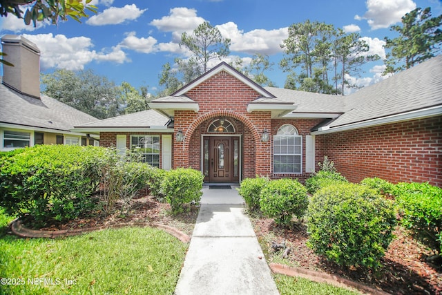 2534 Willow Creek Dr, Fleming Island, FL 32003 - view of front of property featuring brick siding and a shingled roof