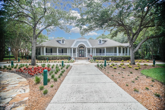 2534 Willow Creek Dr, Fleming Island, FL 32003 - view of front of property featuring a porch and french doors