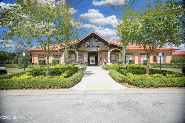 2534 Willow Creek Dr, Fleming Island, FL 32003 - view of front of property featuring stucco siding and stone siding