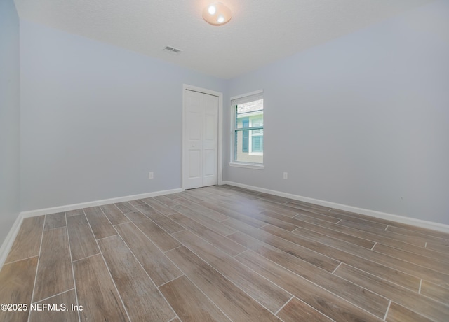 2534 Willow Creek Dr, Fleming Island, FL 32003 - unfurnished room featuring wood finished floors and baseboards
