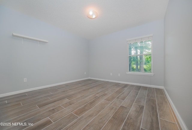 2534 Willow Creek Dr, Fleming Island, FL 32003 - spare room with wood finished floors and baseboards