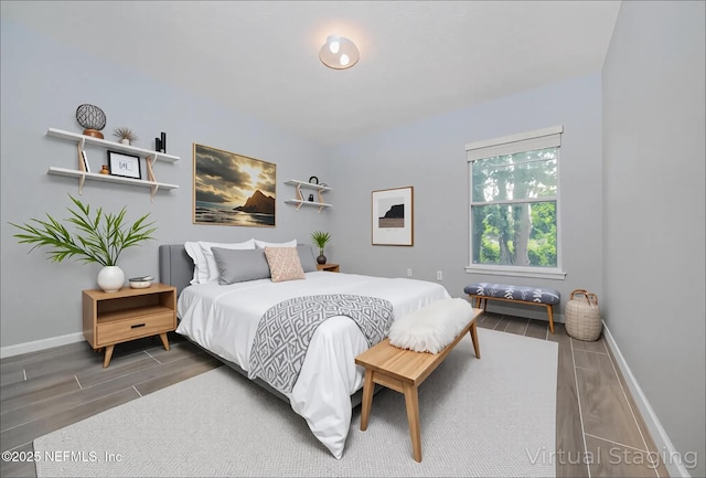 2534 Willow Creek Dr, Fleming Island, FL 32003 - bedroom featuring wood finished floors and baseboards