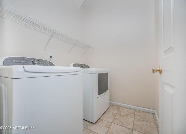 2534 Willow Creek Dr, Fleming Island, FL 32003 - laundry area featuring washer and dryer and baseboards