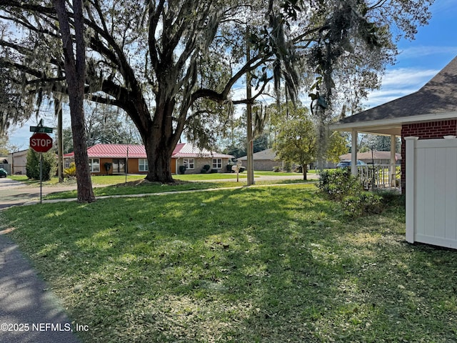 view of yard with fence