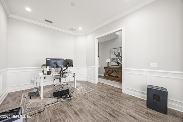 office area with visible vents, recessed lighting, a decorative wall, and wood finish floors