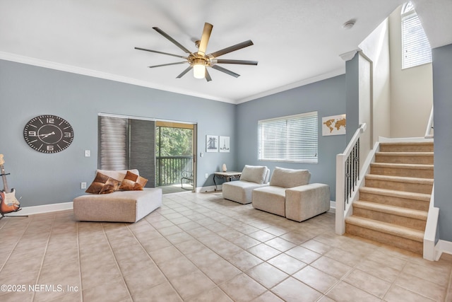 tiled living area featuring stairs, baseboards, a ceiling fan, and crown molding