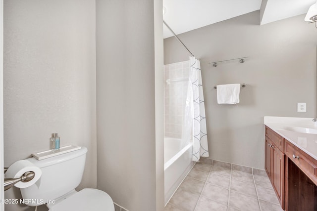 bathroom with toilet, tile patterned flooring, shower / bathtub combination with curtain, and vanity