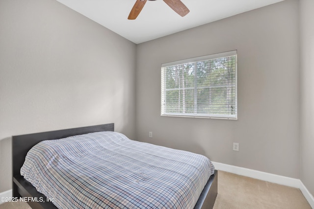 bedroom featuring carpet floors, ceiling fan, and baseboards