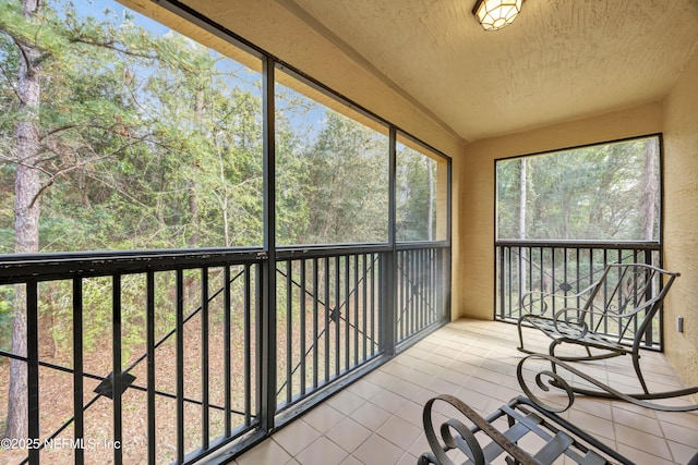 unfurnished sunroom with a healthy amount of sunlight