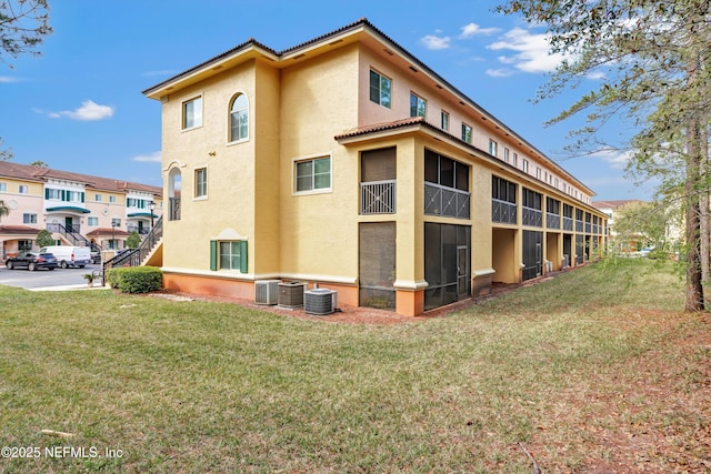 exterior space featuring central AC unit