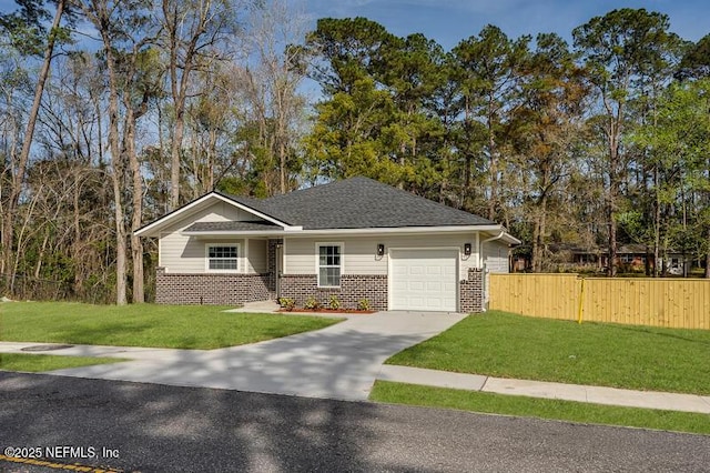 ranch-style house with concrete driveway, brick siding, a front yard, and fence