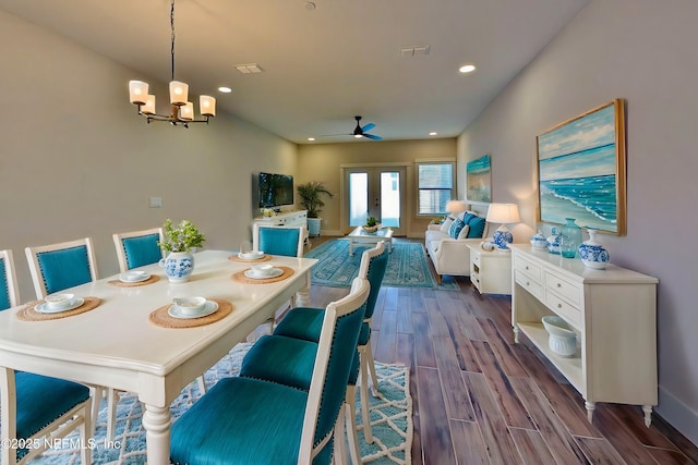 dining space featuring dark wood-style floors, visible vents, and recessed lighting