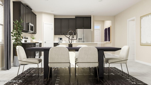 kitchen with baseboards, white fridge with ice dispenser, and range with electric cooktop