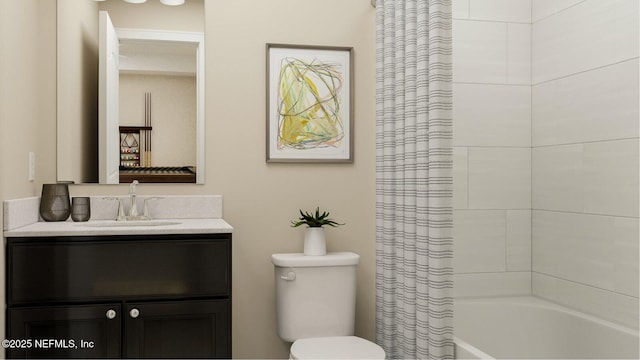 bathroom with vanity, shower / bath combination with curtain, and toilet