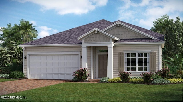 view of front of house with decorative driveway, a front lawn, an attached garage, and a shingled roof