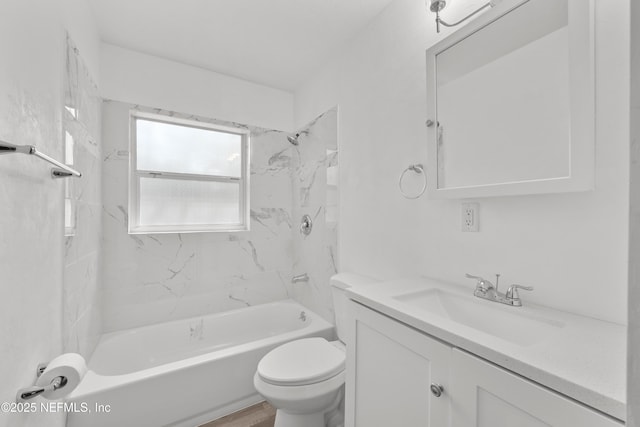 bathroom with shower / tub combination, vanity, and toilet