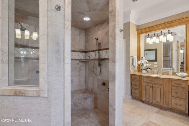 bathroom with walk in shower, crown molding, and vanity