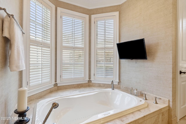 full bathroom featuring a healthy amount of sunlight, a garden tub, and wallpapered walls