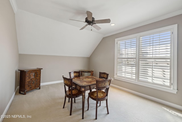 carpeted dining area with recessed lighting, vaulted ceiling, baseboards, and ceiling fan