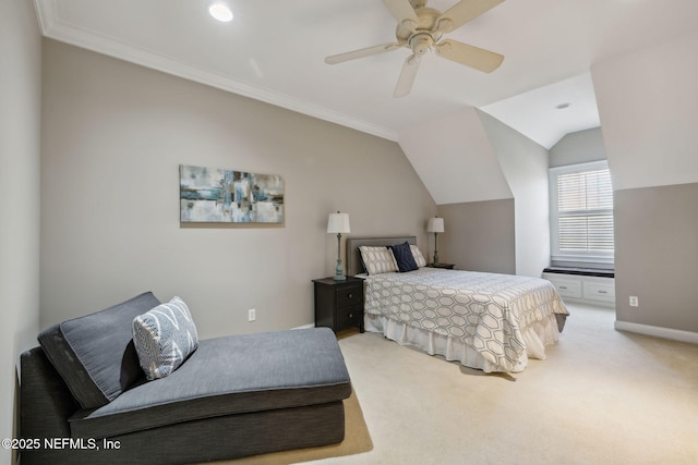 bedroom featuring carpet floors, ornamental molding, a ceiling fan, vaulted ceiling, and baseboards