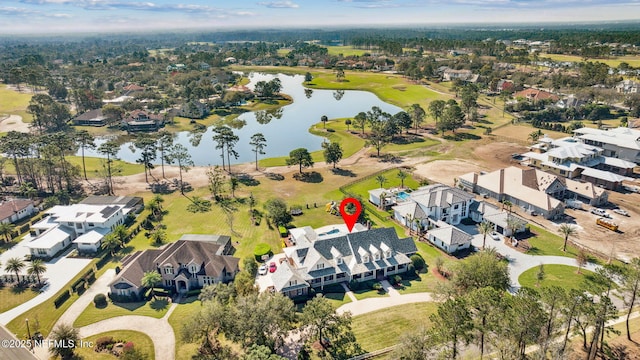 bird's eye view featuring a residential view and a water view