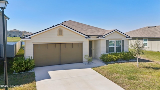 single story home with a garage, a shingled roof, concrete driveway, fence, and a front lawn