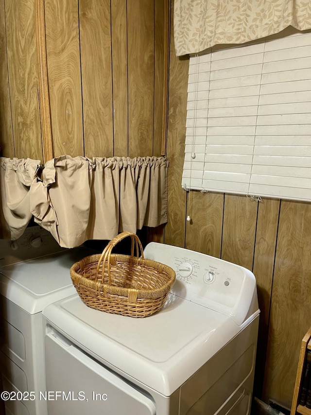 washroom with laundry area and washer and dryer