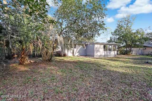 view of yard with fence