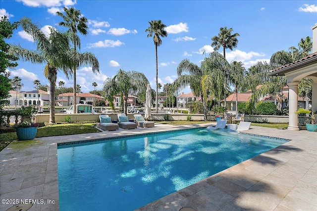 outdoor pool with a patio