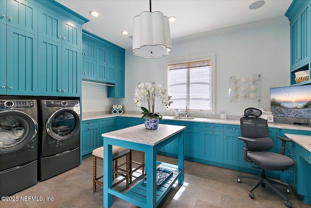 laundry area featuring recessed lighting, a sink, washer and dryer, ornamental molding, and cabinet space