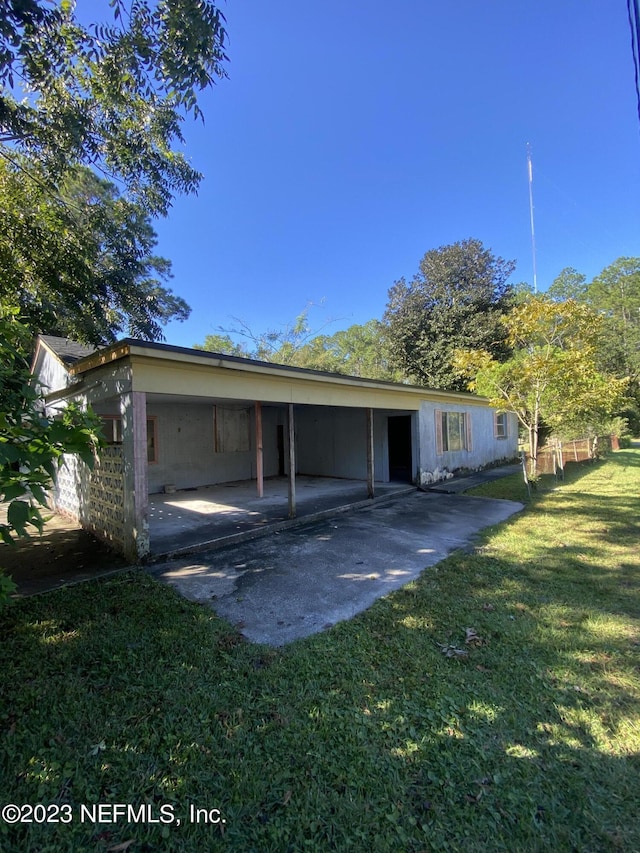 exterior space with a front lawn