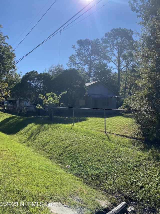 view of yard featuring fence