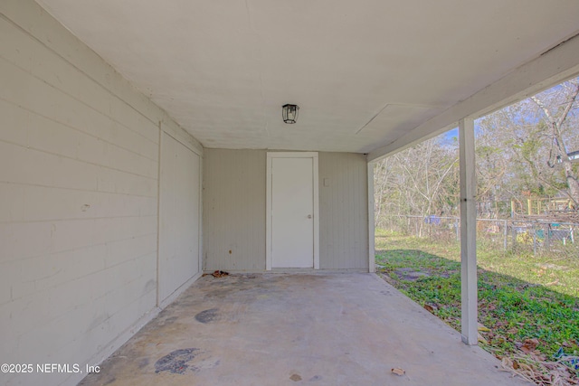 view of patio featuring fence