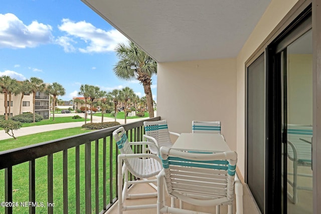 balcony featuring a residential view