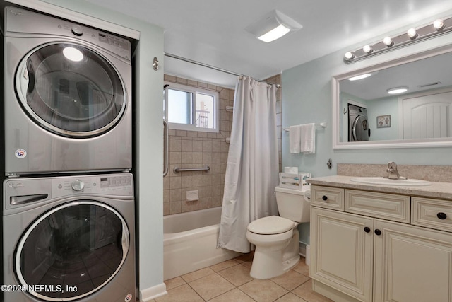 full bathroom with shower / bathtub combination with curtain, toilet, vanity, stacked washing maching and dryer, and tile patterned flooring