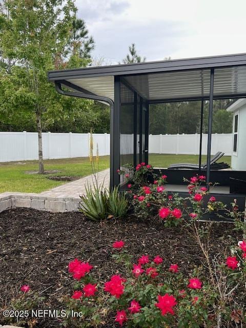 738 Seville Pkwy, Saint Augustine, FL 32086 - view of yard with a sunroom and fence