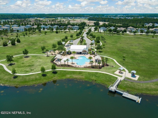 birds eye view of property featuring a water view and a residential view