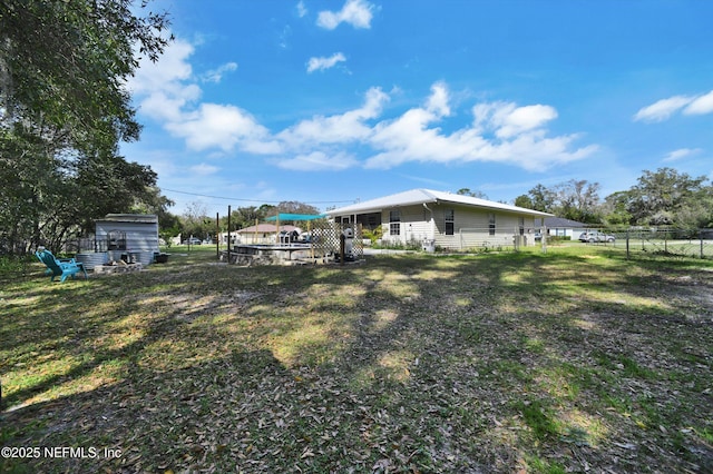 view of yard featuring fence