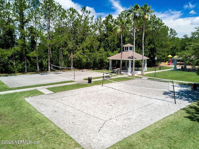 view of property's community with a gazebo, a lawn, volleyball court, and playground community