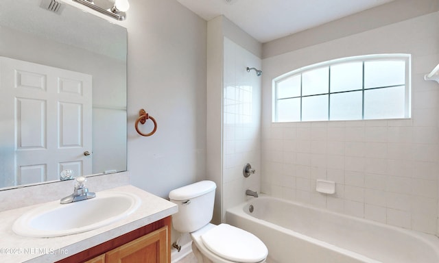 full bath featuring shower / bath combination, toilet, visible vents, and vanity