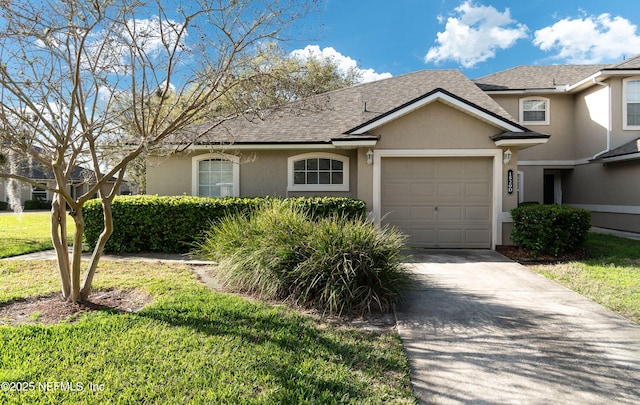 view of front of house with stucco siding, a shingled roof, an attached garage, driveway, and a front lawn