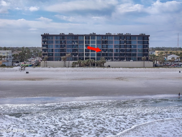 view of building exterior featuring a water view