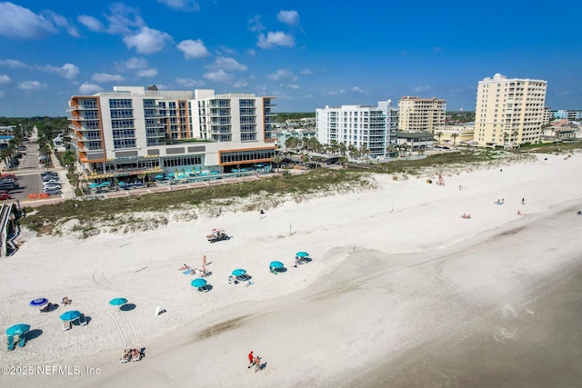 aerial view with a city view and a beach view
