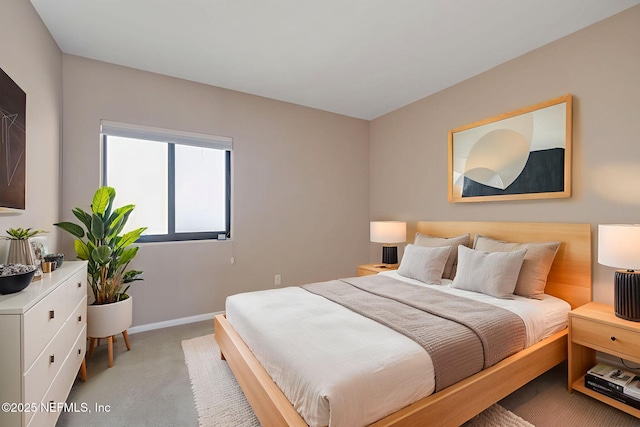601 1st St S Unit 4D, Jacksonville Beach, FL 32250 - bedroom featuring light colored carpet and baseboards