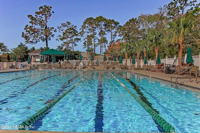 pool featuring fence