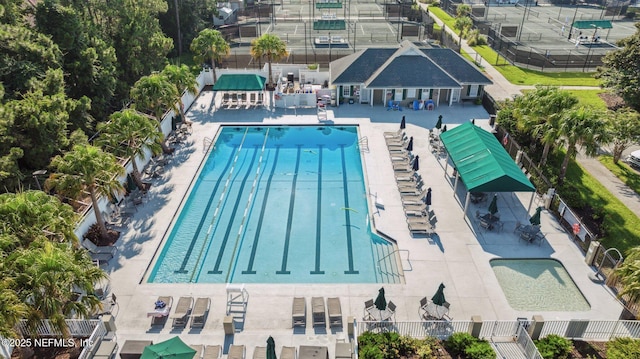 view of swimming pool with fence