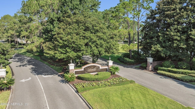 view of road featuring curbs