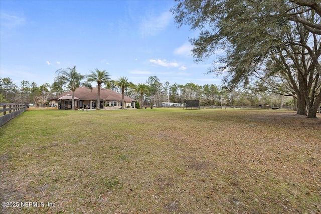 view of yard with fence