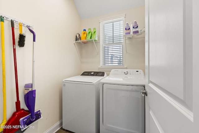 clothes washing area featuring laundry area and washer and dryer